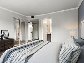 Sherman Oaks apartment for rent - Carpeted bedroom with access to private bathroom.