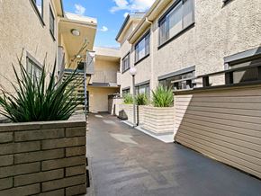 Valley Glen apartment for rent - Drought-tolerant greenery and courtyard at Woodridge Apartments.