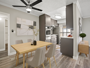 Sherman Oaks apartment for rent - Hardwood floored dining room with view of modern-styled kitchen.