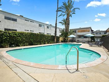 One of two large gated pools and lounging area.