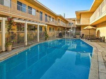 Large solar heated pool  in woodbridge park courtyard.
