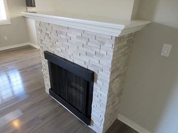 Stone accented fireplace