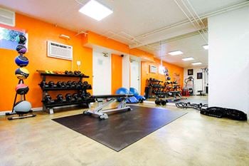 Fitness center with treadmills and weight equipment
