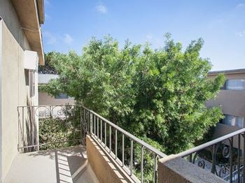 Patio facing building courtyard