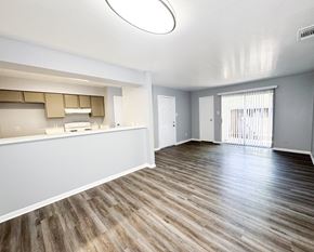 San Antonio apartment for rent - A room with wooden flooring and a white ceiling.
