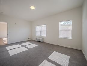 Spearfish apartment for rent - empty bedroom with carpet