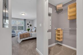 Monmouth Junction apartment for rent - Interior photo of the Boulders at Beekman showing a walk in closet and a doorway leading to the primary bedroom