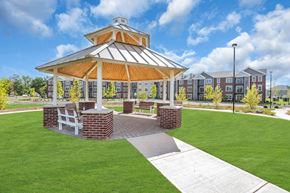 Belle Mead apartment for rent - Exterior photo of Meadows at Montgomery showing the community gazebo with benches.