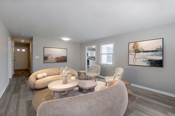 Bridgewater Township apartment for rent - A living room with a large couch and two chairs.