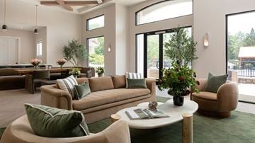 Princeton apartment for rent - A living room with a large couch and a coffee table.