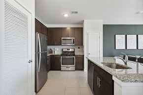 Middlesex apartment for rent - Modern kitchen with stainless steel appliances at The Lofts at Middlesex