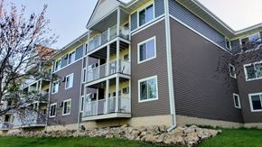 Cottage Grove townhouse for rent - the exterior of an apartment building with balconies
