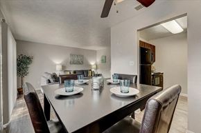 Denton apartment for rent - a dining room table with plates and glasses