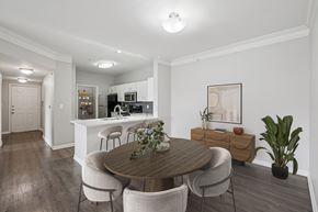 Fort Worth apartment for rent - A dining room with a wooden table and chairs.