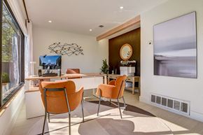 Hurst apartment for rent - a dining room with a table and chairs and a large window