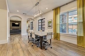 Farmers Branch apartment for rent - a dining room with a table and chairs