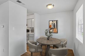 Austin apartment for rent - A dining room with a table and chairs.