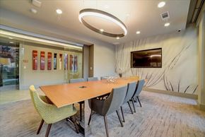 San Antonio apartment for rent - A conference room with a long table and chairs.