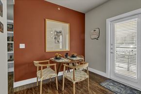 San Antonio apartment for rent - a dining room with a table and chairs and a window