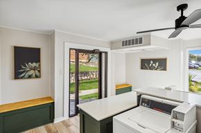 Carrolton apartment for rent - a kitchen with a washer and dryer