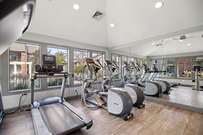 Hendersonville apartment for rent - A gym with treadmills, elliptical machines and other exercise equipment.