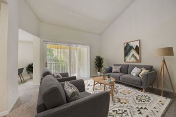 Sarasota apartment for rent - a living room with couches and a coffee table