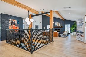 Denton apartment for rent - A large open space with a black gate in the middle.