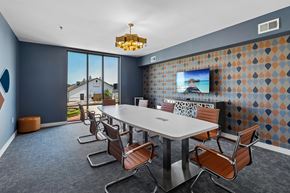 Wylie apartment for rent - A conference room with a long table and chairs.