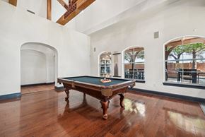 Lewisville apartment for rent - a room with a pool table in the middle of it