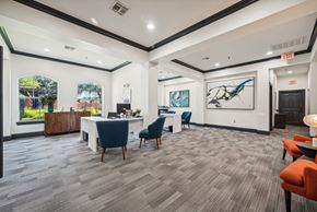 Lewisville apartment for rent - a conference room with a table and chairs in the middle