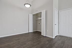 Kyle apartment for rent - A room with a white door and a light on the ceiling.