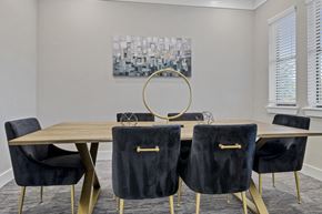 Kyle apartment for rent - A conference room with a large table and chairs.