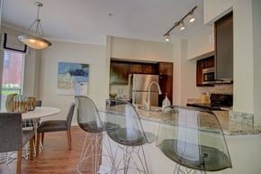 The Woodlands apartment for rent - a kitchen and dining area in a 555 waverly unit