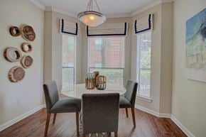 The Woodlands apartment for rent - a dining room with a table and chairs