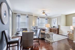 Bartlett apartment for rent - A dining room with a table set for two and a ceiling fan.
