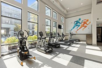 Two-level – state of the art fitness center including cardio, lifting, and yoga equipment