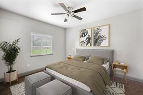 Burleson apartment for rent - a bedroom with a bed and a ceiling fan