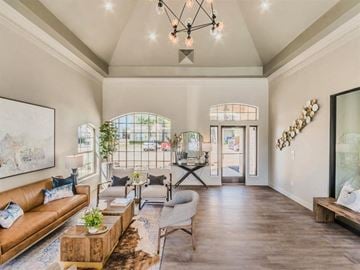 Grapevine apartment for rent - a living room with a couch and a table
