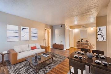 Irving apartment for rent - A living room with a white couch and a coffee table.