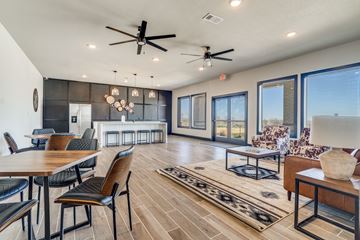 Cresson apartment for rent - A modern living room with a dining table and chairs.