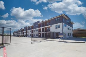Houston apartment for rent - a row of new apartment buildings on a sunny day