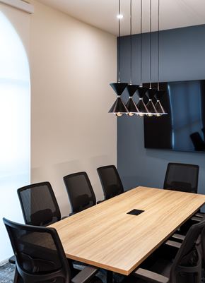 San Juan Capistrano apartment for rent - A conference room with a long table and chairs.
