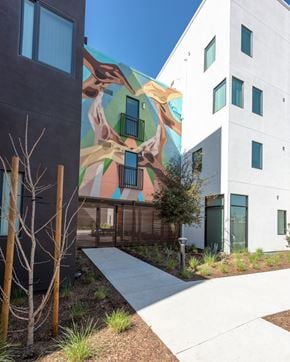 Santa Ana townhouse for rent - A modern building with a mural on the side.