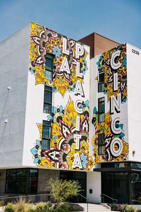 Santa Ana apartment for rent - A building with a mural on the side of it.