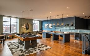Manchester apartment for rent - A room with a pool table and a bar.