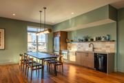 Manchester apartment for rent - A modern kitchen with a dining table and chairs.