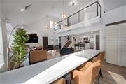 Chelmsford apartment for rent - A modern dining area with a long table and chairs.