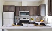 Brunswick apartment for rent - kitchen with stainless steel appliances and oak cabinets at Atlantic Pointe, Maine
