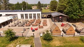 Brunswick apartment for rent - A park with a building, picnic tables, and a playground.