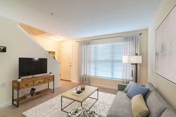 Hooksett apartment for rent - a living room with a couch and a television